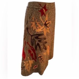 Dolce & Gabbana tweed skirt with suede leaf appliqués